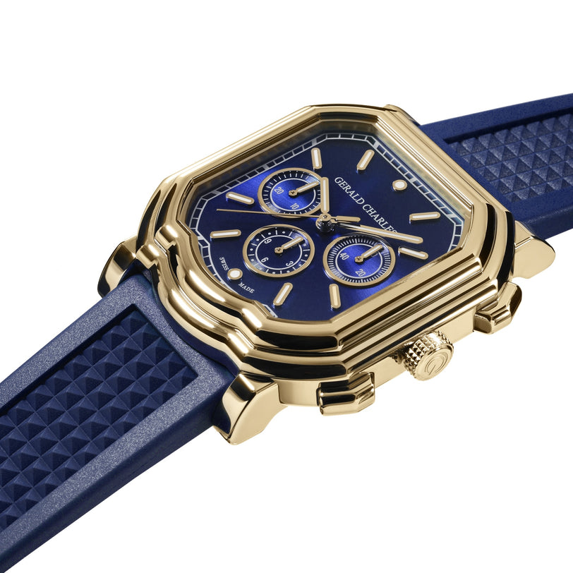 The Gerald Charles Maestro 3.0 Chronograph features a gold case, blue face and strap, three subdials, and geometric accents on the band.