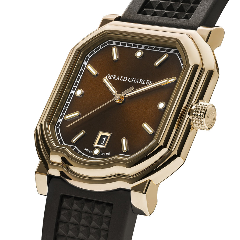 The Gerald Charles Maestro 2.0 Ultra-Thin is a gold wristwatch featuring a brown dial, black strap, and a date display at 6 oclock.