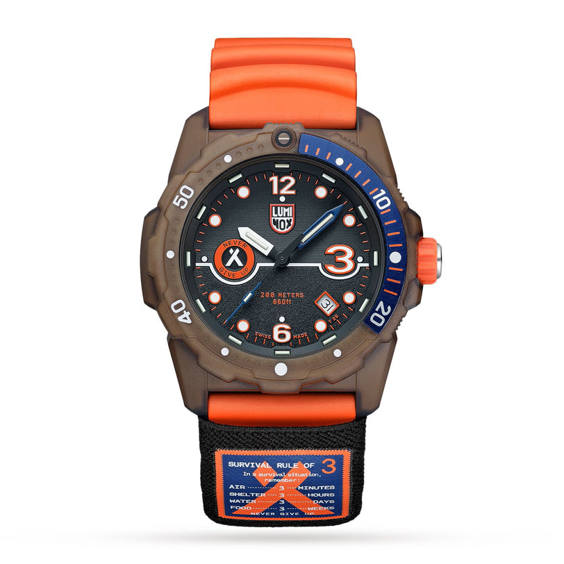 The Luminox Bear Grylls Survival Eco Orange Rule Of 3 wristwatch features a black and orange dial, an orange strap, and blue bezel accents.