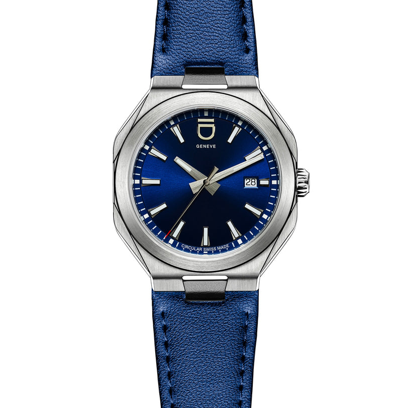 ID Geneves Circular 1 - Blue wristwatch features a blue face, date display, and blue leather strap, shown on a white background.