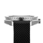 Side view of the DOXA Sub 200 Sharkhunter diver’s watch with a 316L stainless steel case, textured black strap, and unidirectional rotating bezel, isolated on white.