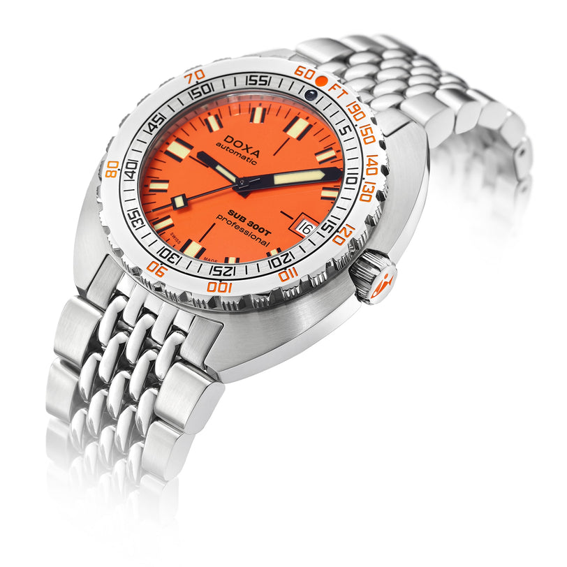 The DOXA Sub 300T Professional diver’s watch, featuring a bright orange dial with black and white details and a stainless steel bracelet, is displayed at a slight angle on a white background.