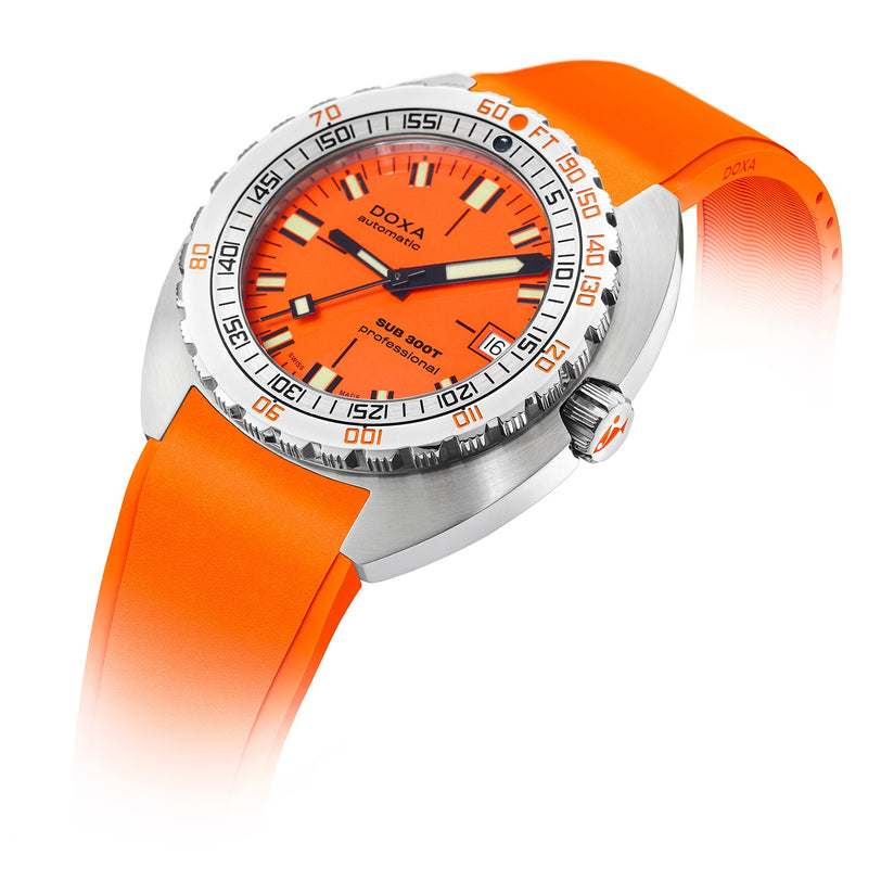 The DOXA Sub 300T Professional is a stainless steel diver’s watch with an orange dial and strap, Super-LumiNova markers, unidirectional bezel, helium release valve, and date display at 3 o’clock.
