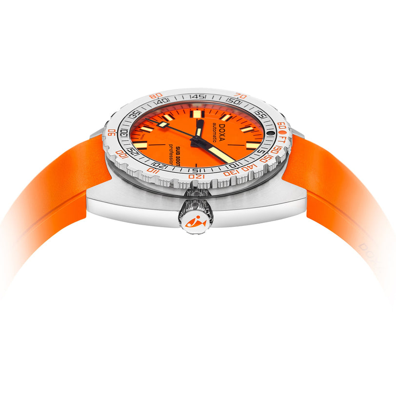 Side view of the DOXA Sub 300T Professional divers watch featuring a stainless steel case, orange rubber strap, white rotating bezel with minute markings, and Super-LumiNova accents for enhanced underwater visibility.