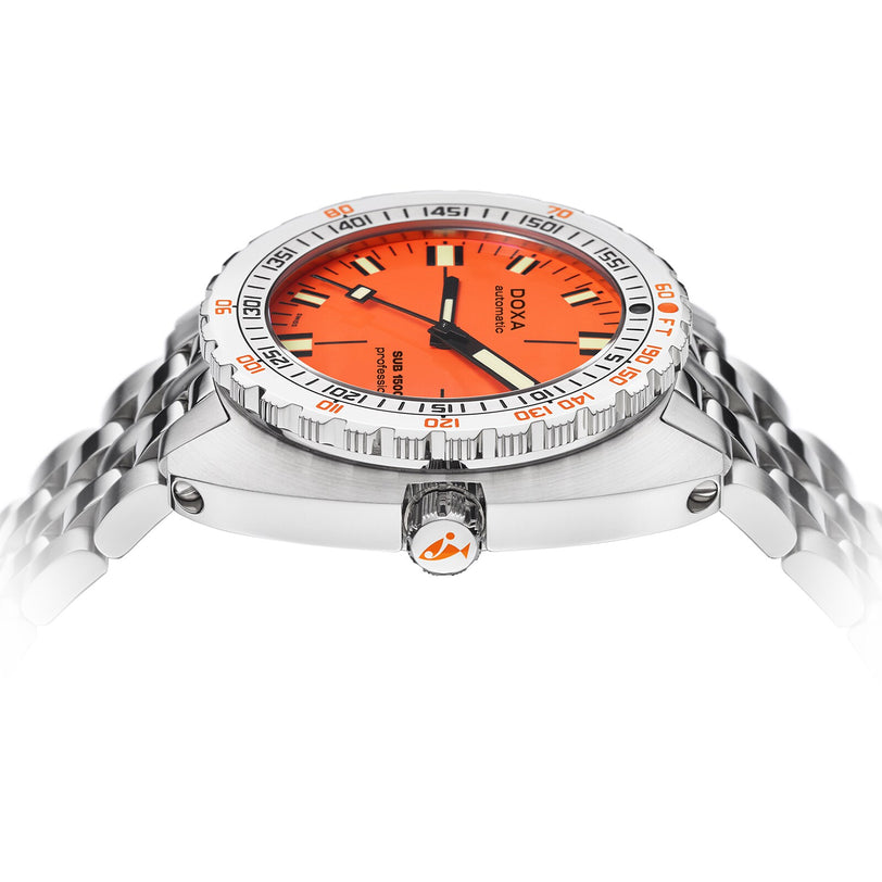 The DOXA Sub 1500T Professional is a stainless steel divers watch with an orange dial, bold hour markers, and a metal bracelet—shown from a low side angle and engineered for depths up to 1500 meters.