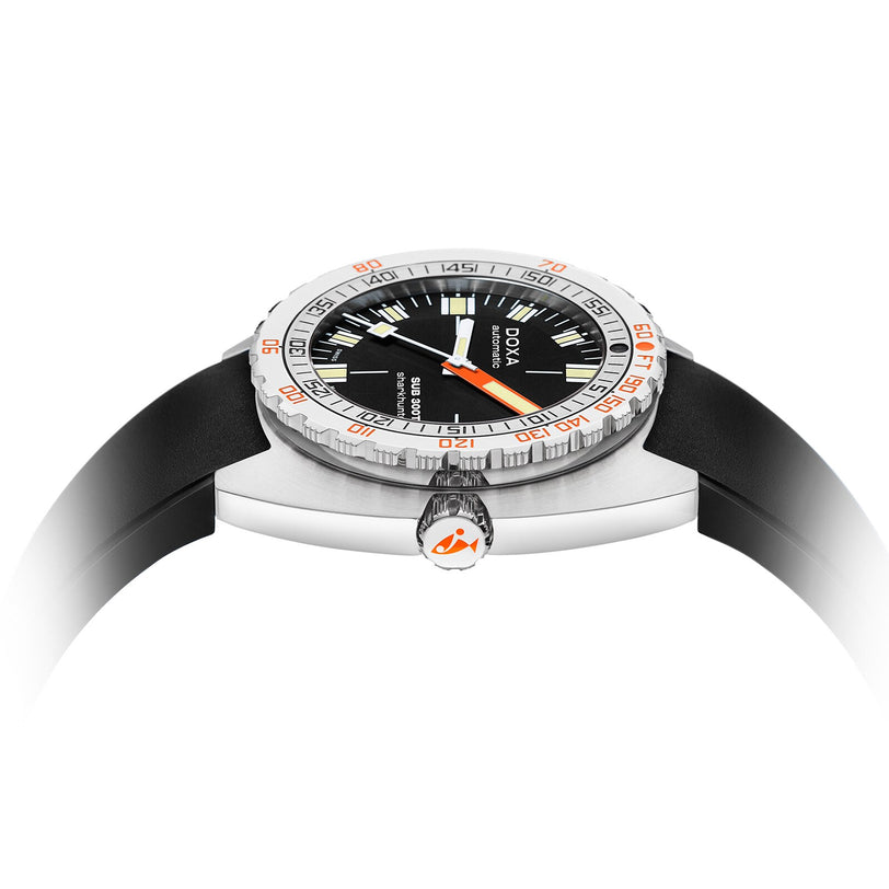 Side view of the DOXA Sub 300T Sharkhunter diver’s watch with a black strap, black dial, orange accents, branded crown, and helium release valve against a white background.