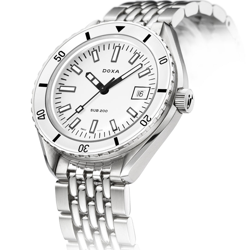 The DOXA Sub 200 Whitepearl diver’s watch has a stainless steel case, white dial with black markers, date window at 3 oclock, and a metal bracelet.