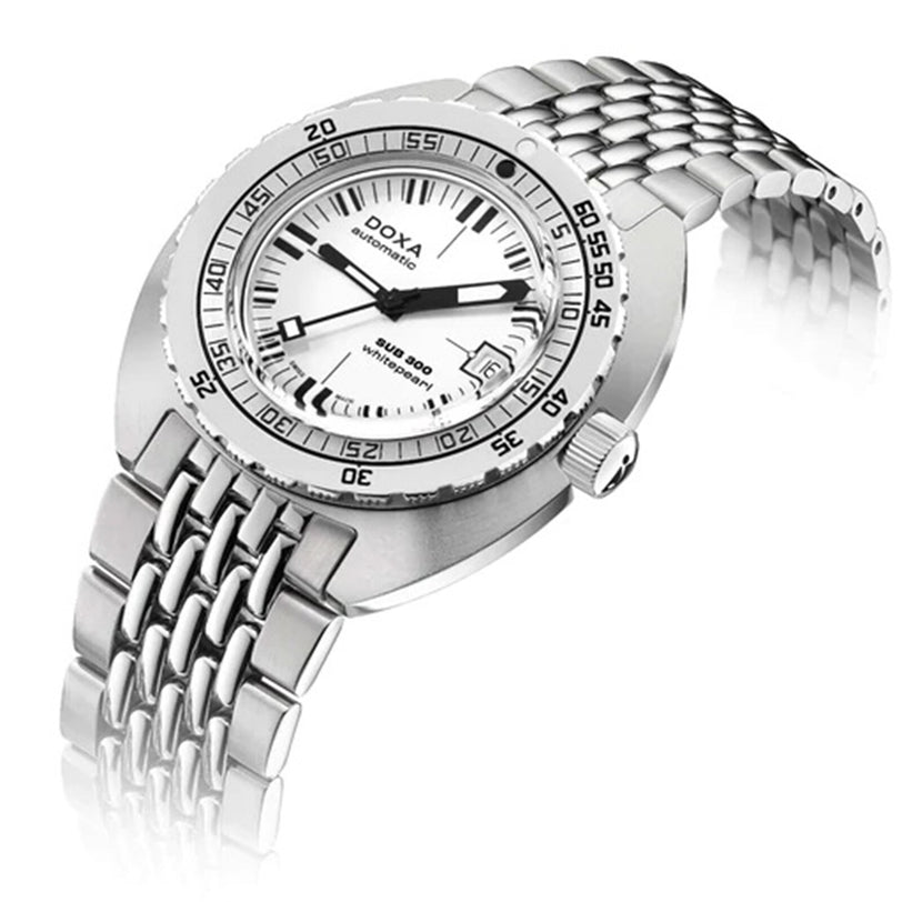 A DOXA Sub 300 Whitepearl stainless steel wristwatch with a white dial, date display, unidirectional bezel, and silver bracelet is shown at an angle on a white background.