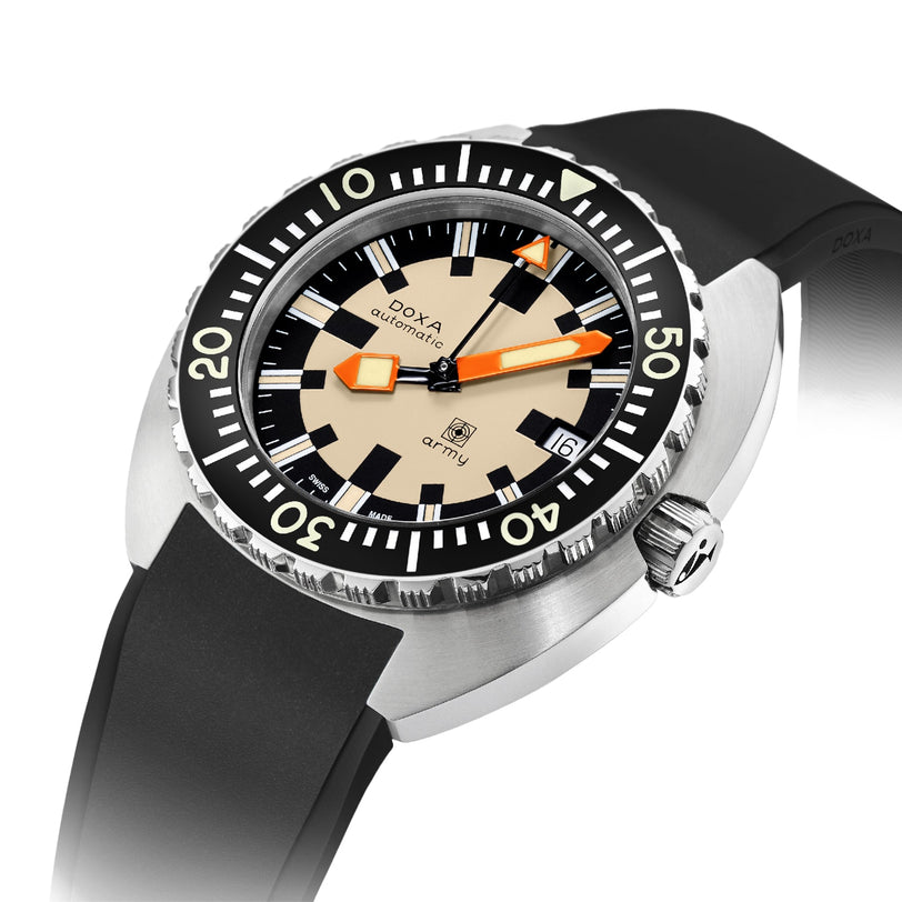 A close-up of the DOXA Army Stainless Steel by DOXA, featuring a beige dial, black bezel, orange hands, black rubber strap, and Super-LumiNova® coating for enhanced visibility.