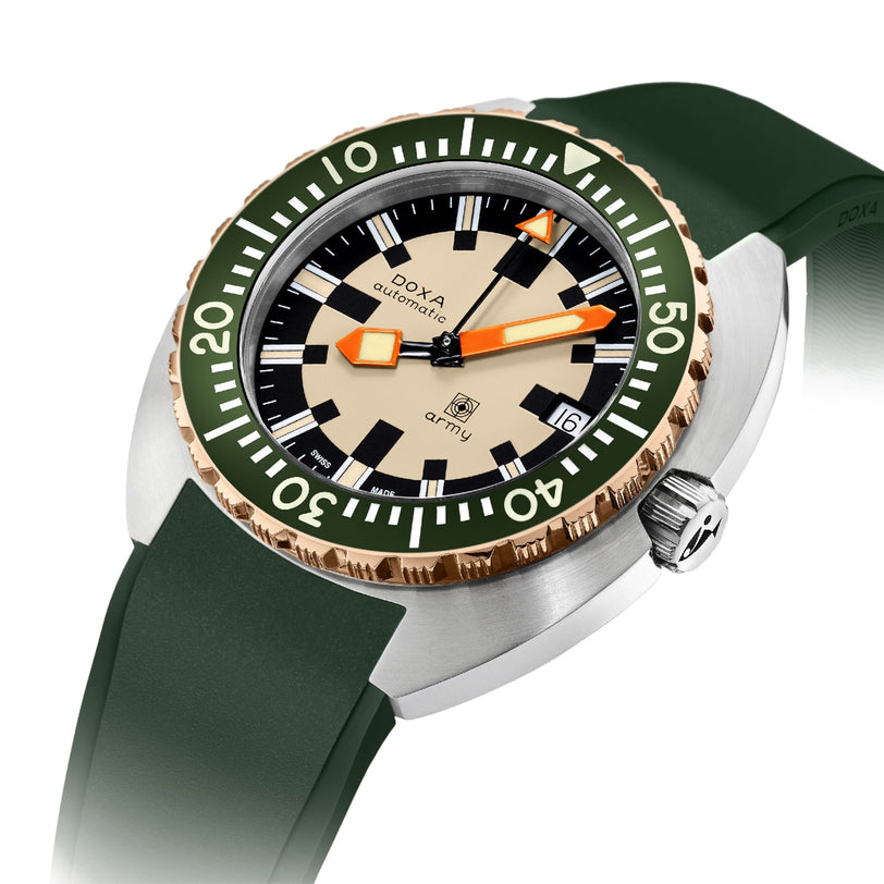 The DOXA Army Bronze is a DOXA dive watch featuring a green bezel, beige dial, orange hands, and a green rubber strap.