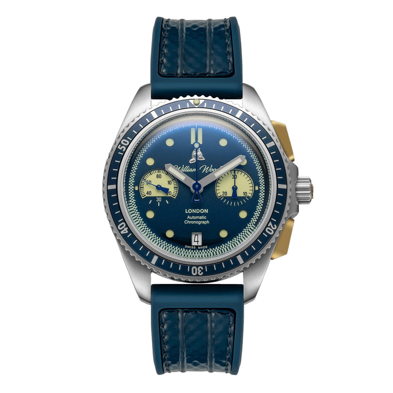 The Triumph Collection - Oxygen Edition by William Wood is a blue and silver wristwatch with a round face, two subdials, and a blue leather strap.