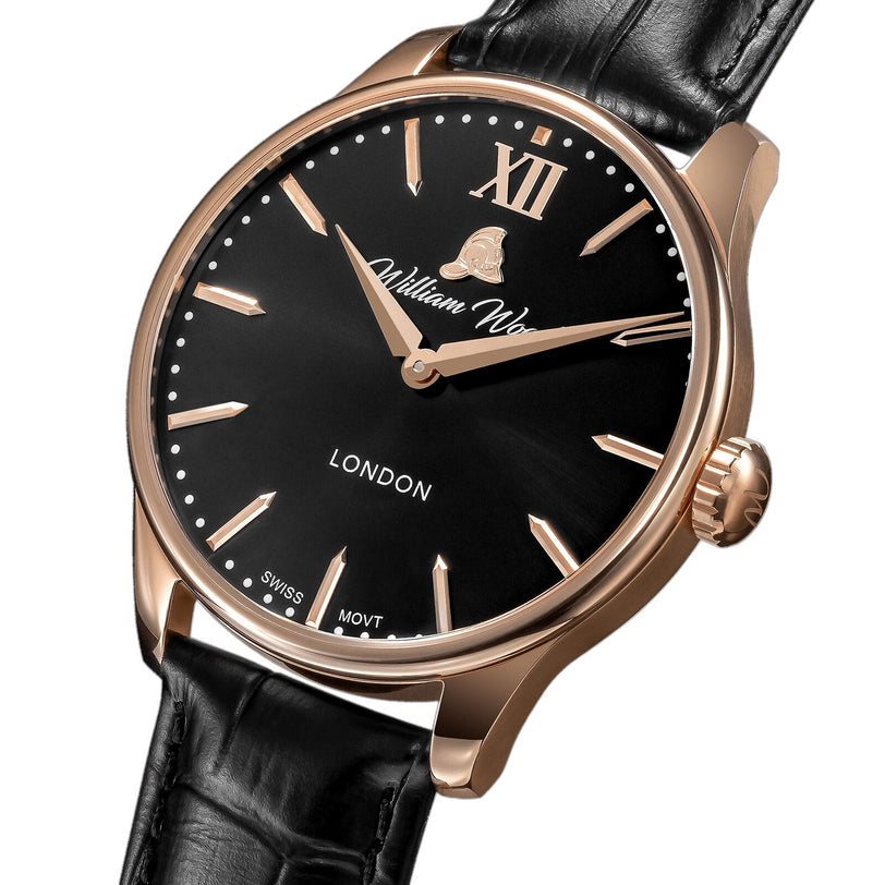The William Wood Chivalrous Collection - Rose Gold is a wristwatch featuring a black face, leather strap, and Roman numeral XII at the top.