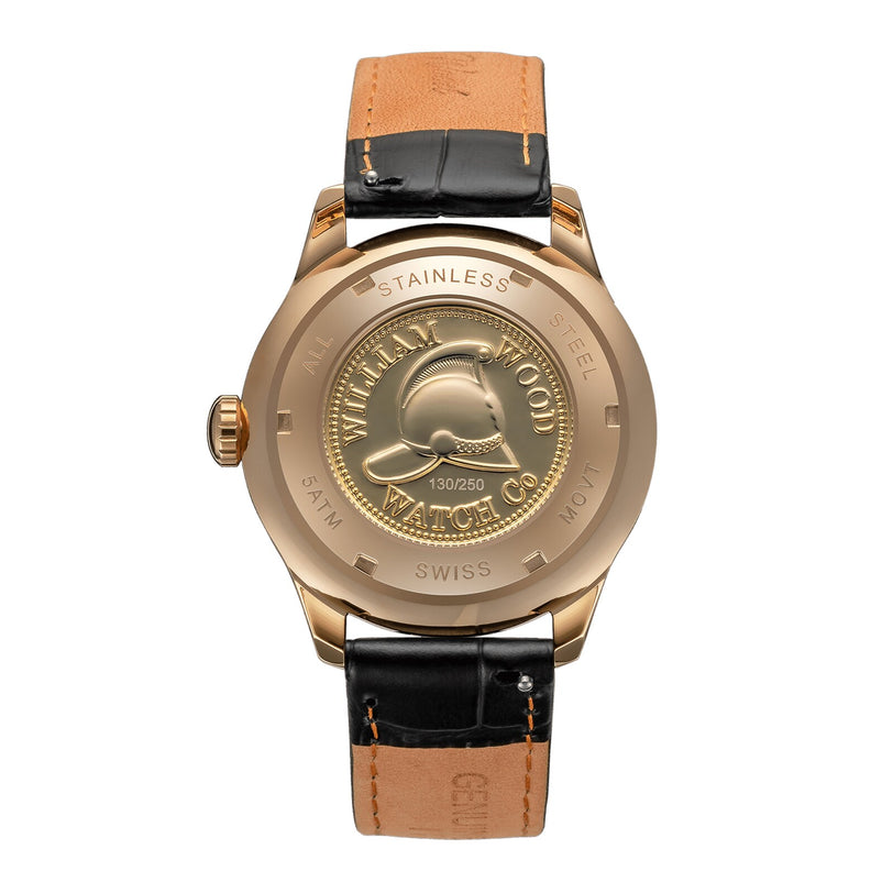 The Chivalrous Collection - Rose Gold by William Wood features a gold watch case back engraved with WILLIAM WOOD WATCH CO and a helmet, plus a black and tan leather strap.