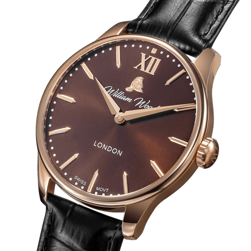 The William Wood Chivalrous Collection - Chocolate is a brown and gold wristwatch with a black leather strap, featuring the William Wood logo on the dial.