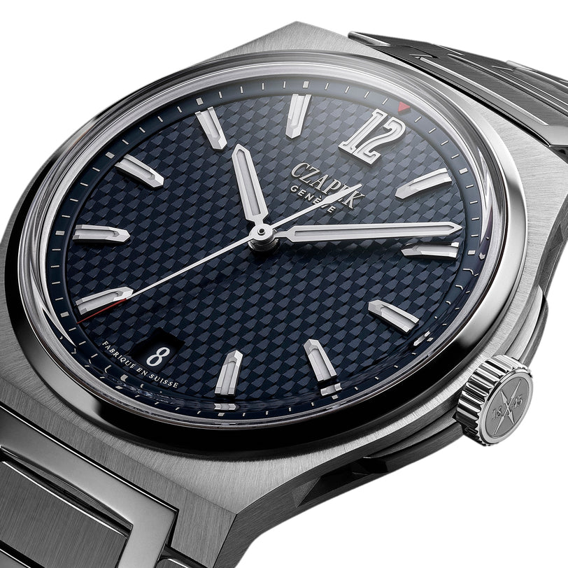 Close-up of the Czapek Antarctique Passage de Drake Deep Blue, a luxury stainless steel wristwatch featuring a textured blue dial and silver hour markers.