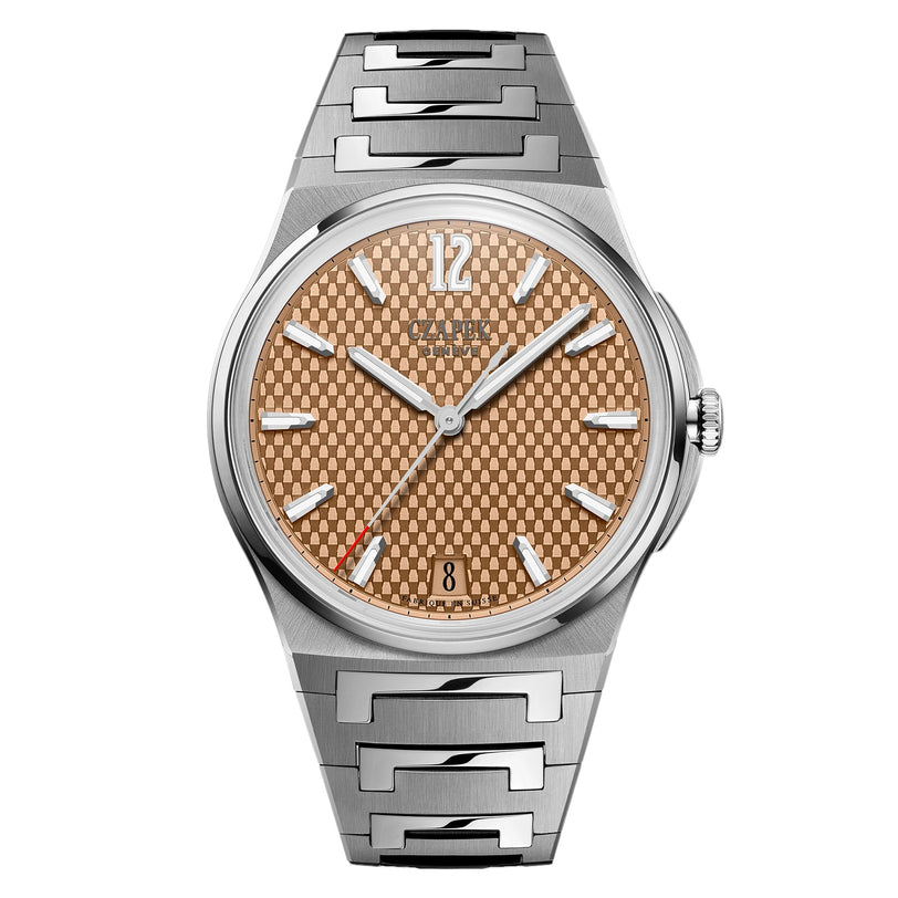 The Czapek Antarctique Passage de Drake Salmon S is a silver wristwatch featuring a salmon dial, silver markers, and a date window at 6 o’clock.