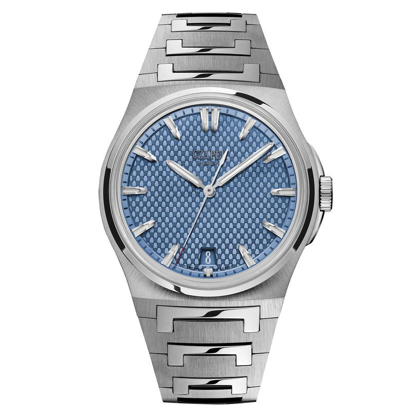 The Czapek Antarctique Passage de Drake Glacier Blue L is a silver wristwatch with a textured blue dial, silver hour markers, and a date window at 6 o’clock.