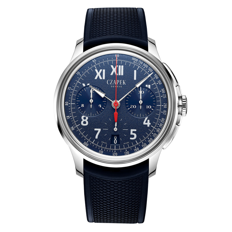 The Czapek Faubourg De Cracovie California Blue features a chronograph dial, silver case, and a dark blue textured strap.