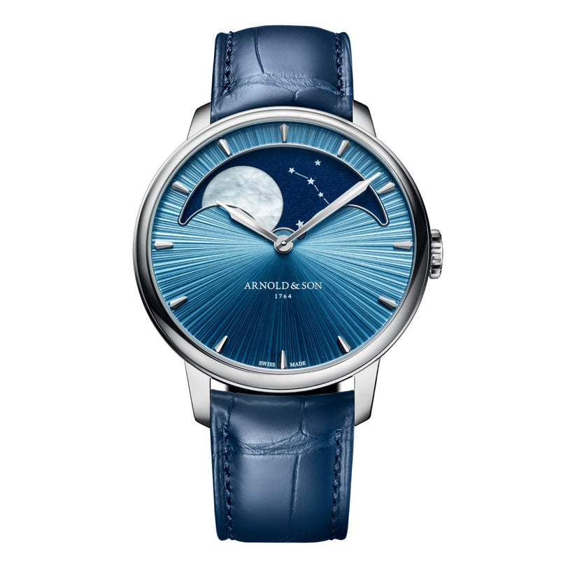 The Arnold & Son Perpetual Moon 41.5mm Platinum is a luxury blue watch featuring a moon phase display, star details, and a blue leather strap.