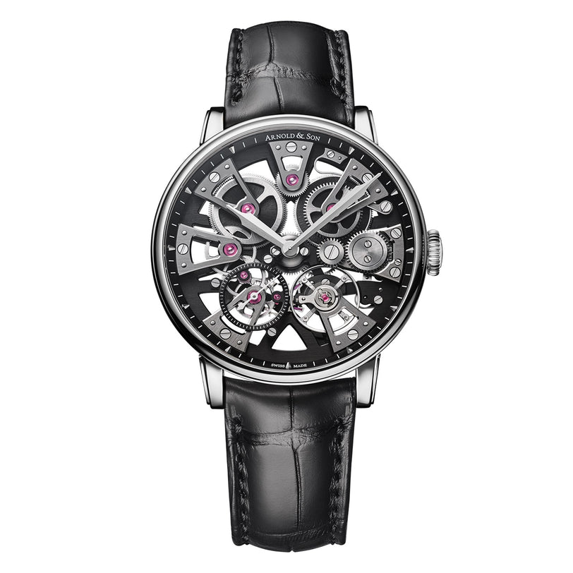 The Arnold & Son Nebula 38 Steel is a skeleton mechanical wristwatch with visible gears, a black leather strap, and a silver case, shown on a white background.
