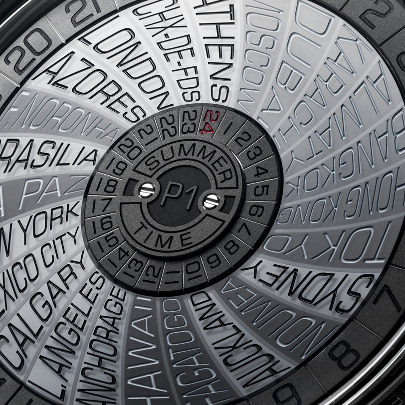 Close-up of the Greubel Forsey GMT Balancier Convexe watch face featuring world cities and time zones in a modern, metallic design.