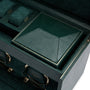 WOLF British Racing Double Watch Winder with Storage features dark green leather, gold accents, compartments, two watch holders, and a covered section.