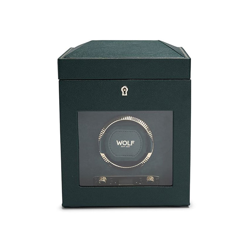 A green WOLF British Racing Single Watch Winder with Storage features a glass front, the WOLF logo, and a lock symbol above.