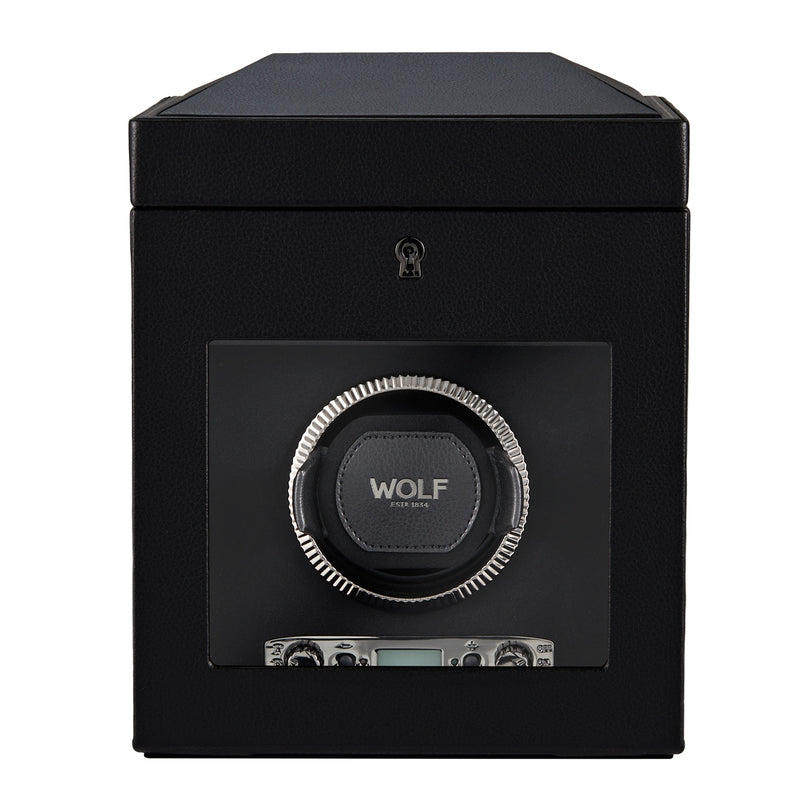 A black WOLF British Racing Single Watch Winder with storage, featuring a dial, digital display, and a keyhole above the front lock.