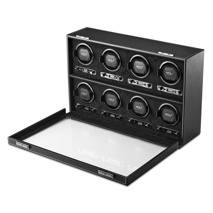 The WOLF British Racing 8 Piece Watch Winder is a black box with eight slots for single watches and a forward-opening glass lid.