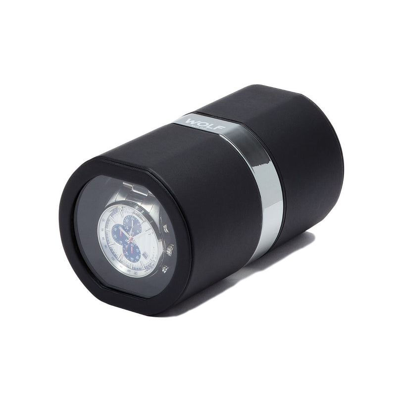 The WOLF Rocket is a black cylindrical watch winder featuring a glass window that displays your wristwatch inside.