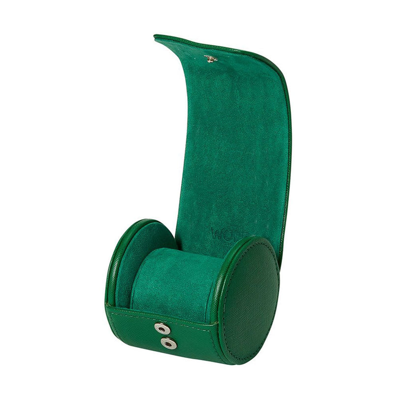 The WOLF Tutti Frutti Single Watch Roll features a green leather case with snap buttons, a curved lid, and a soft interior, shown here open.