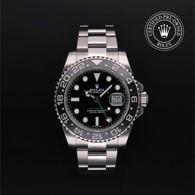 Rolex Certified Pre-owned GMT M116710LN-0001 front on black background