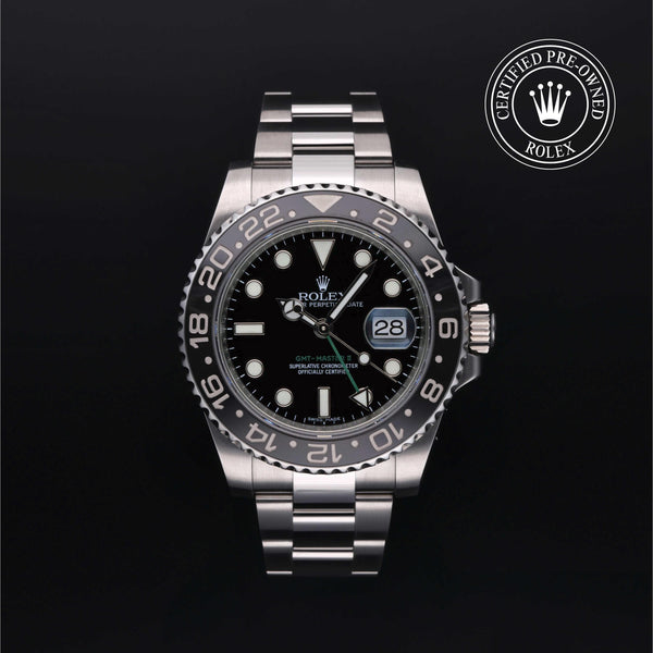 Rolex Certified Pre-owned GMT M116710LN-0001 front on black background