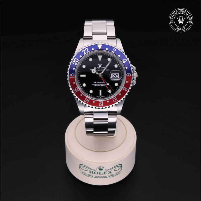 Rolex Certified Pre-owned GMT M16710BLRO-0005 front on black background