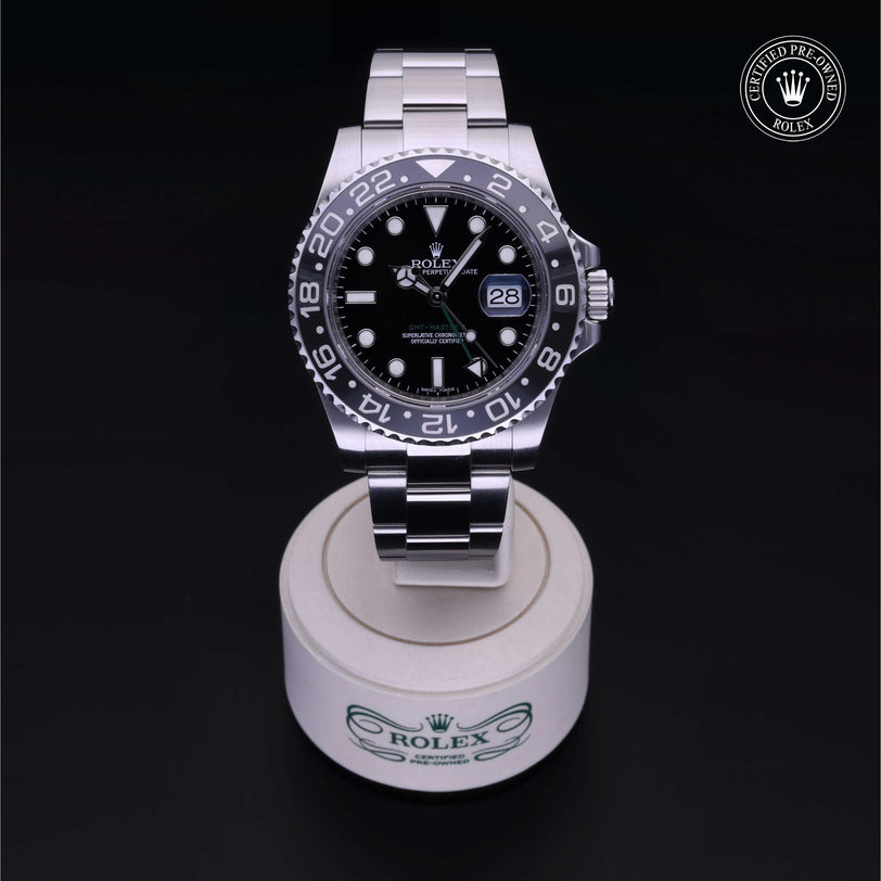 Rolex Certified Pre-owned GMT M116710LN-0001 front on black background