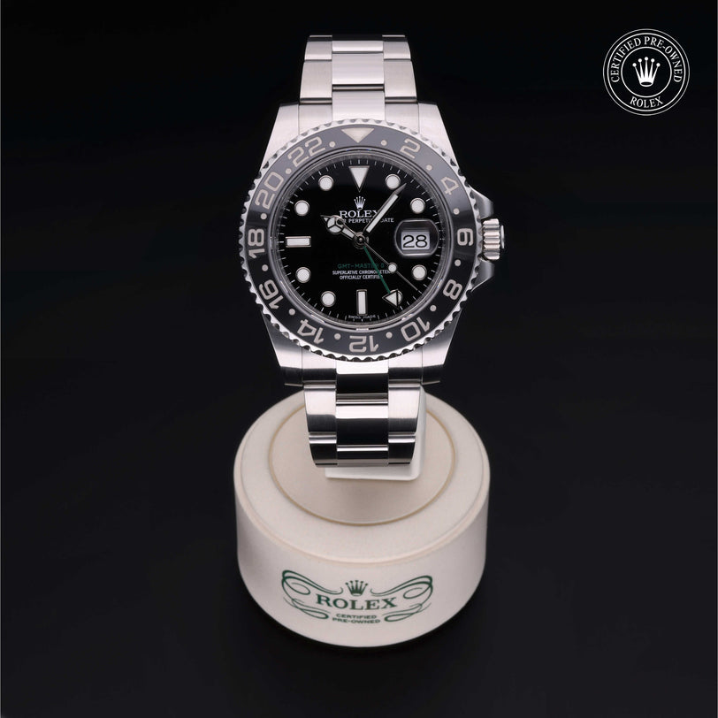 Rolex Certified Pre-owned GMT II M116710LN-0001 front on black background
