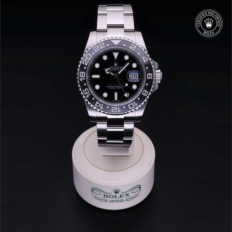 Rolex Certified Pre-owned GMT M116710LN-0001 front on black background