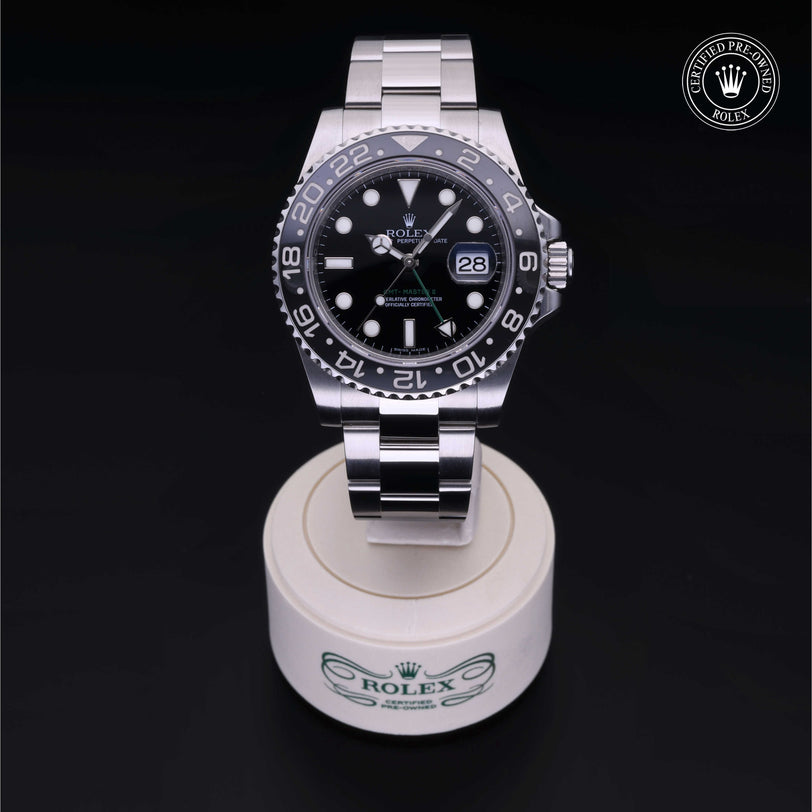 Rolex Certified Pre-owned GMT M116710LN-0001 front on black background