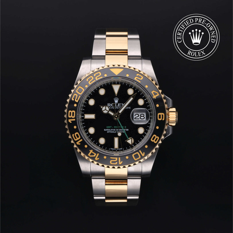 Rolex Certified Pre-owned GMT M116713LN-0001 front on black background