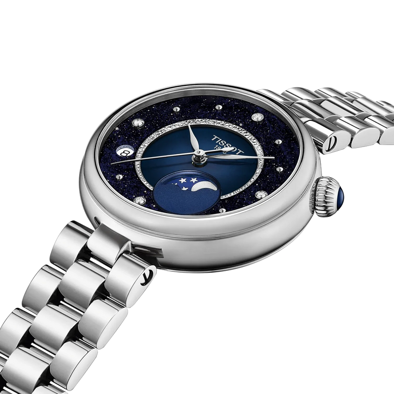 Silver stainless steel women's watch with dark blue dial, moonphase indicator, diamond hour markers, and matching bracelet.