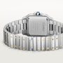 A close-up of the Santos De Cartier Watch by Cartier shows its stainless steel back and bracelet with gold screw accents.