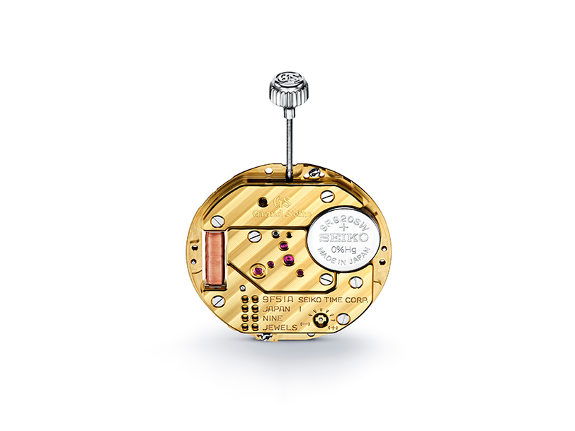 Gold watch mechanism with Seiko branding on a white background
