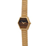 Piaget Hexagonal Tigers Eye wristwatch featuring a brown face and gold metal band, displayed on a white background.
