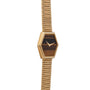 Piaget Hexagonal Tigers Eye gold watch features a brown hexagonal face and a segmented gold band, displayed on a white background.
