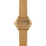 Piagets Hexagonal Tigers Eye gold wristwatch features a geometric hexagonal face and a ribbed metal band, shown from the back.