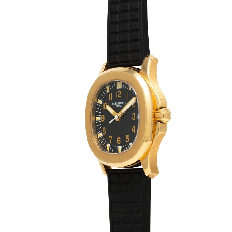 The Patek Philippe Aquanaut features a gold case, black dial with gold numerals, and a black textured strap, shown from the side.
