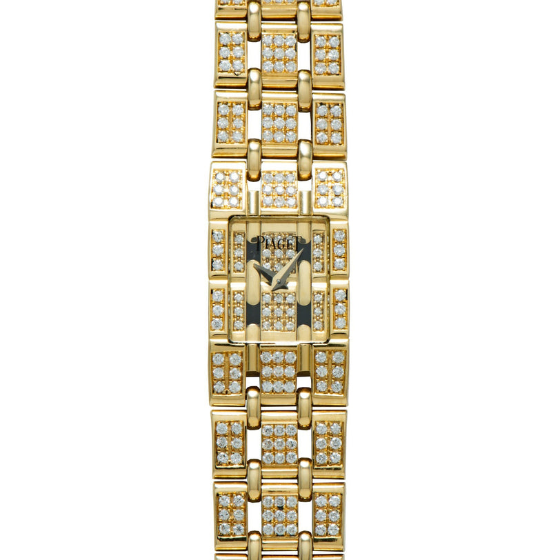 Piaget Polo Pave gold wristwatch with a rectangular face, diamond accents on the band and dial, shown from above.