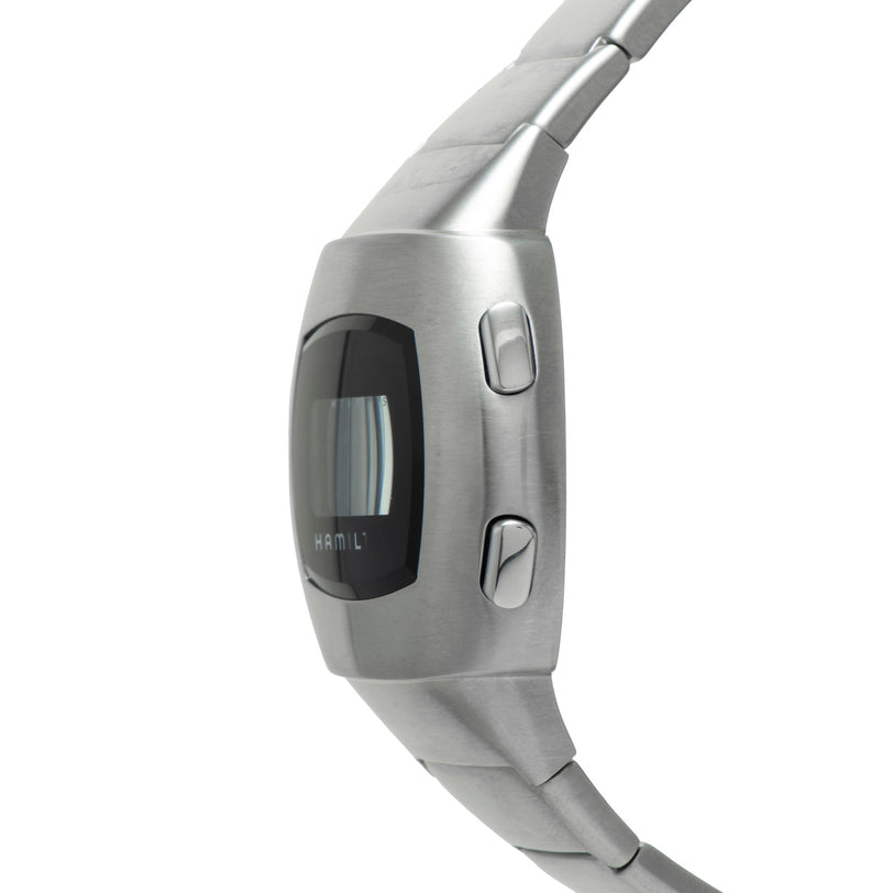 Silver Hamilton digital watch with black oval display and side buttons on gray rubber strap.