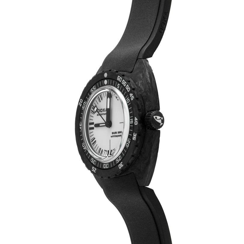 DOXA Sub 300 Carbon watch with white dial, black carbon case, rotating bezel, and black rubber strap.