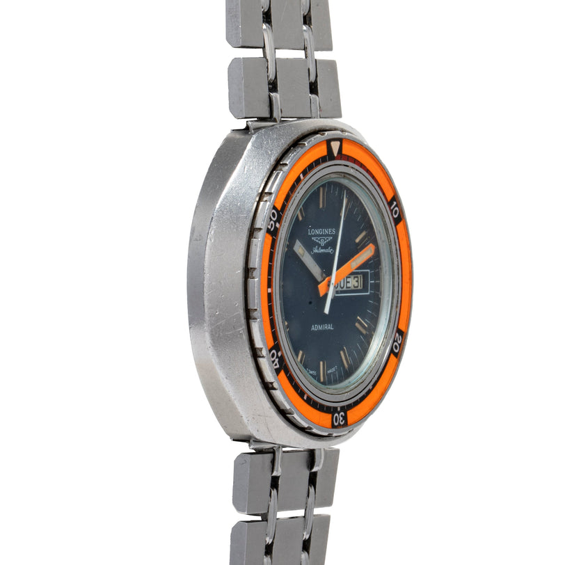 Silver-tone Longines Admiral Diver watch with orange bezel, dark dial, and metal bracelet.